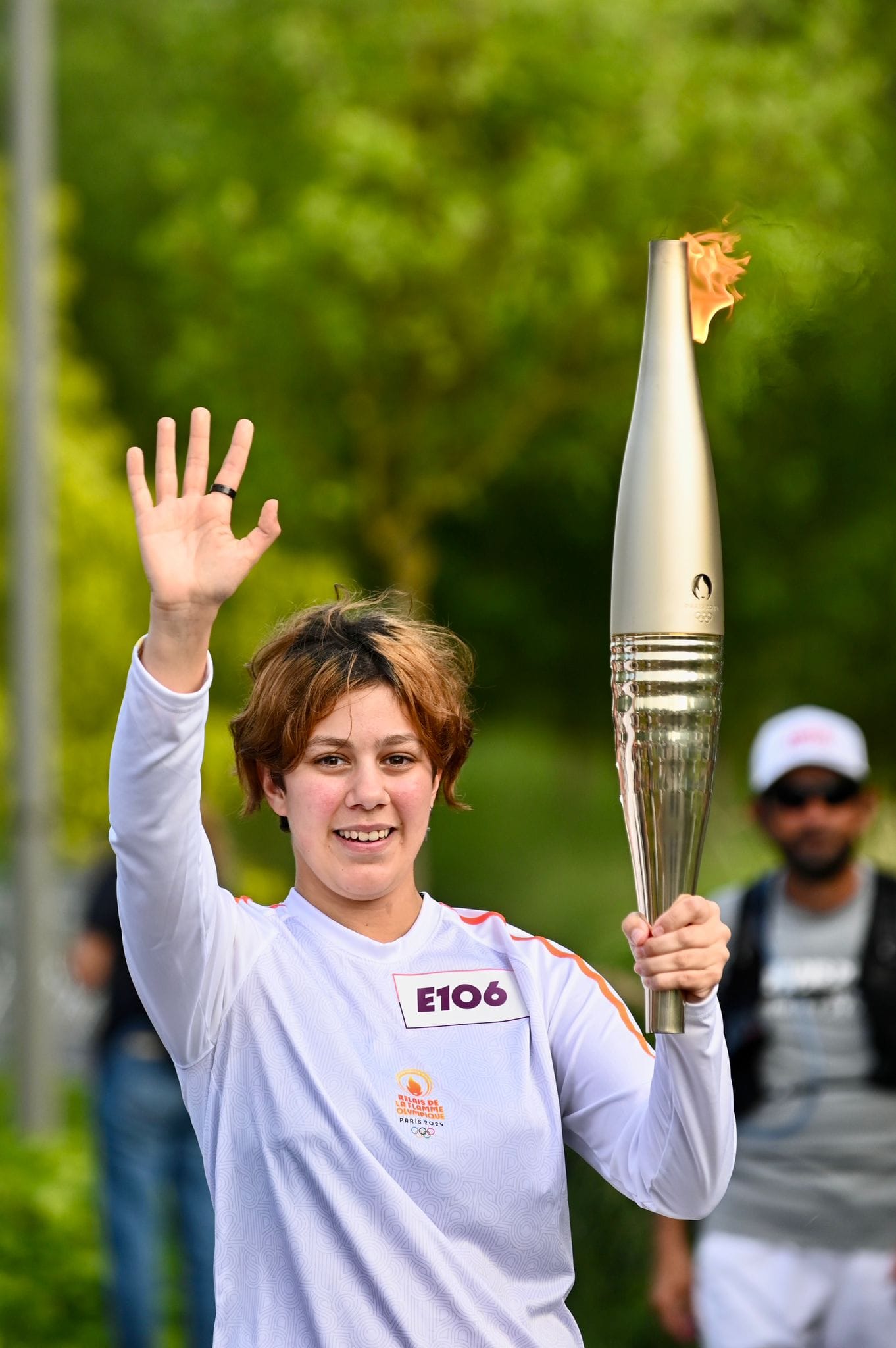 Image de Maelys Feve avec la flamme olympique